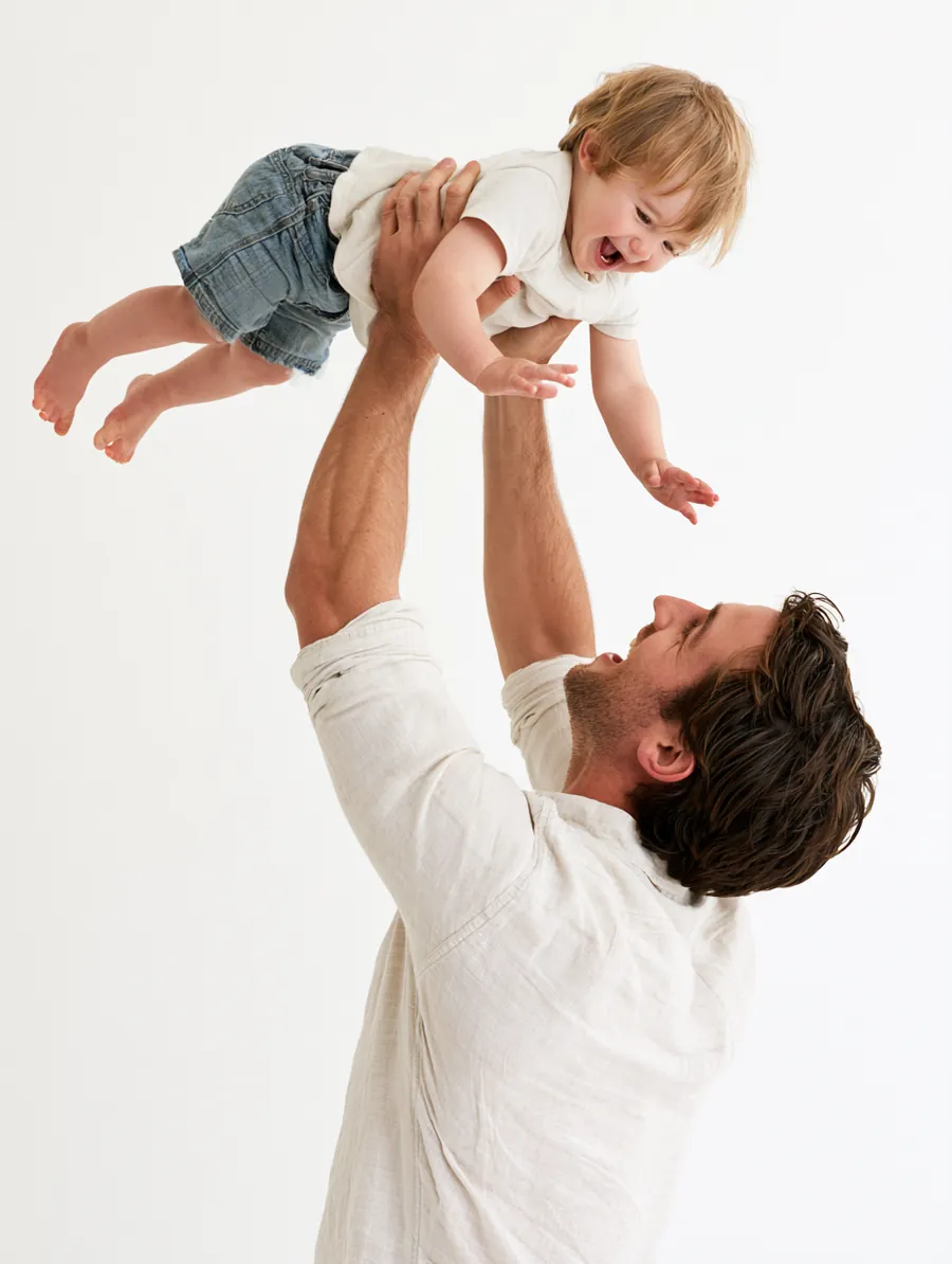 American father and child representing household income behind a personal loan